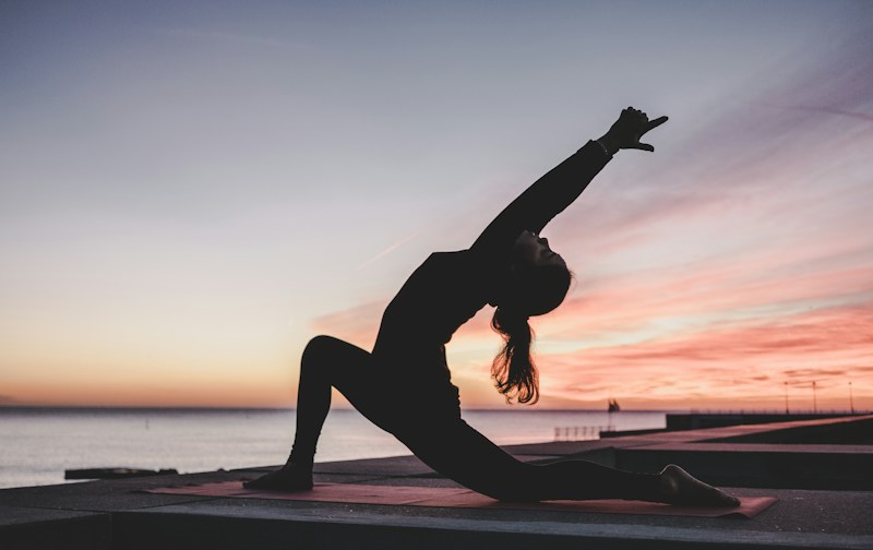 Person practicing a calm wellness routine